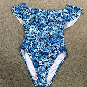 Over the shoulder blue floral bathing suit